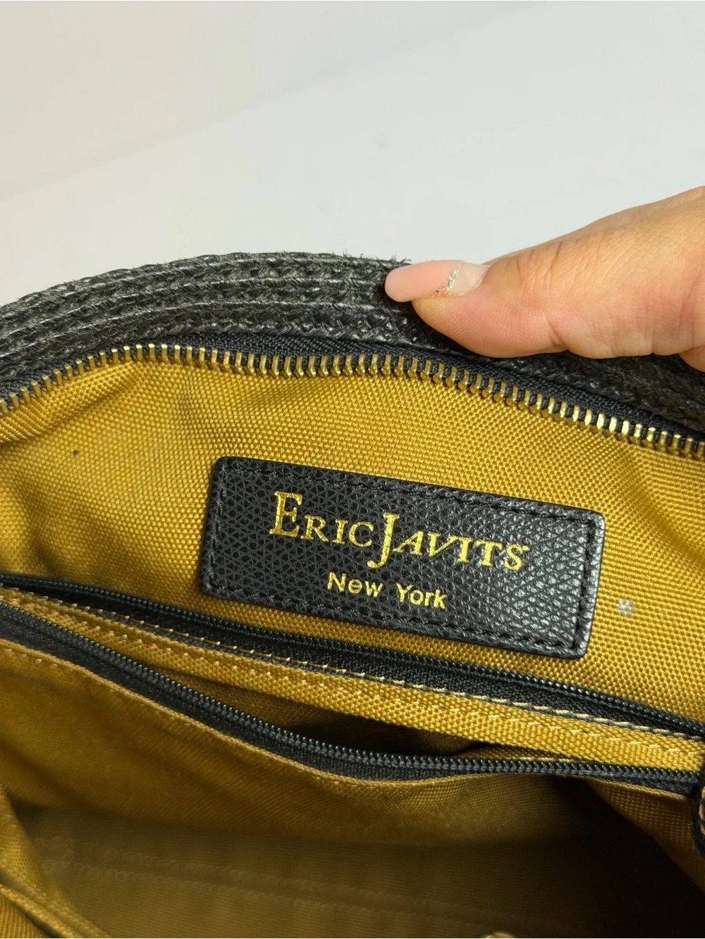 Eric Javits Woven Escape Shoulder bag in a Black and Natural Straw Colorway